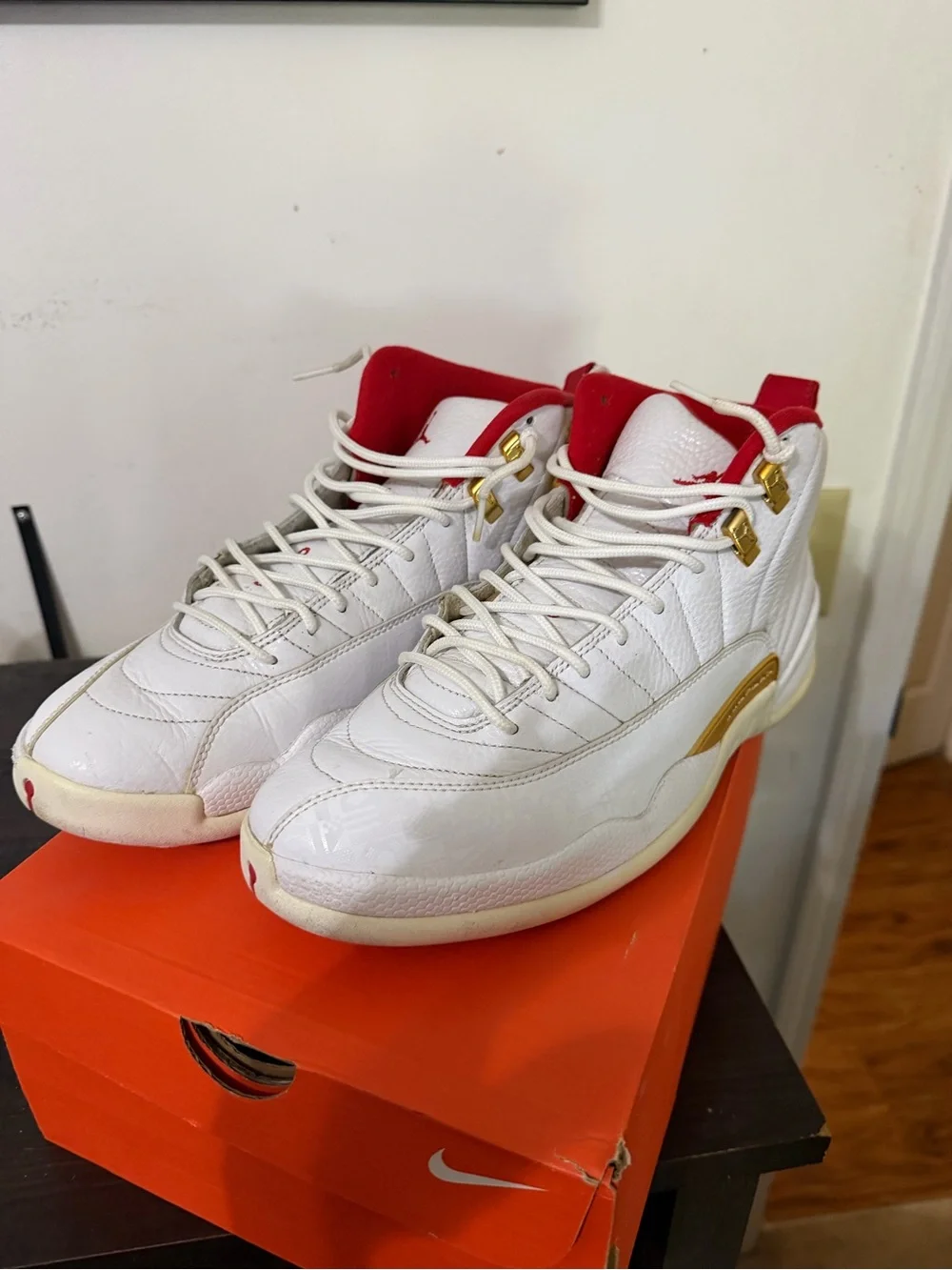 Jordan Men’s White Basketball Sneakers with Red Lining and Gold Accents